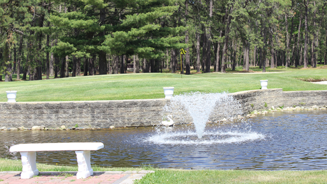 The fountain in the pond behind the ninth green at Buena Vista Country Club.